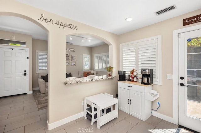 130 Bloomfield Ln, Rancho Santa Margarita, CA 92688 - kitchen featuring baseboards, light tile patterned floors, white cabinets, light countertops, and recessed lighting