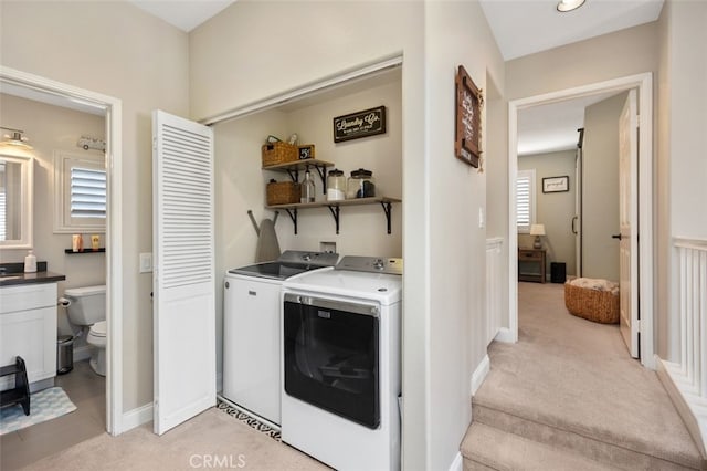 130 Bloomfield Ln, Rancho Santa Margarita, CA 92688 - washroom featuring washer and clothes dryer, light colored carpet, and baseboards