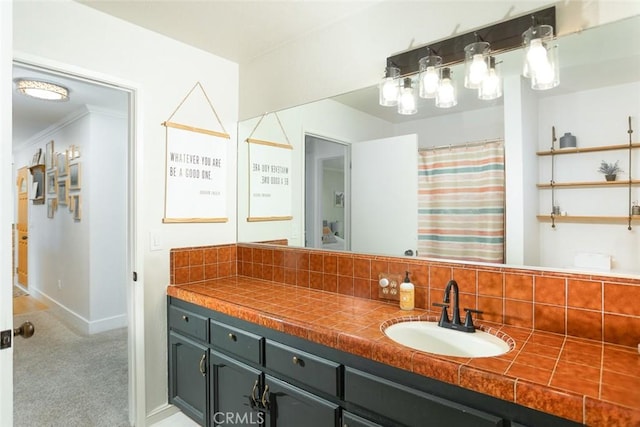 49 Bob Way, Oroville, CA 95965 - bathroom featuring vanity, baseboards, crown molding, and decorative backsplash