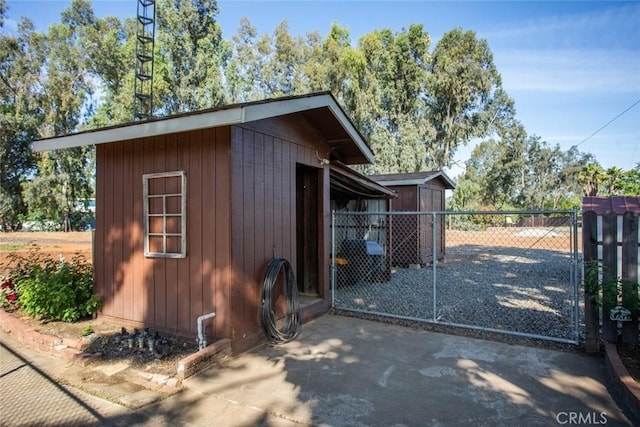 49 Bob Way, Oroville, CA 95965 - view of shed featuring fence and a gate