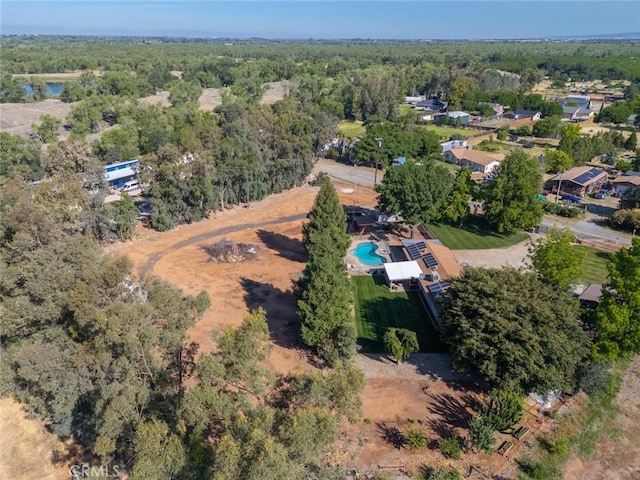 49 Bob Way, Oroville, CA 95965 - aerial view of property and surrounding area with a pool area and a heavily wooded area