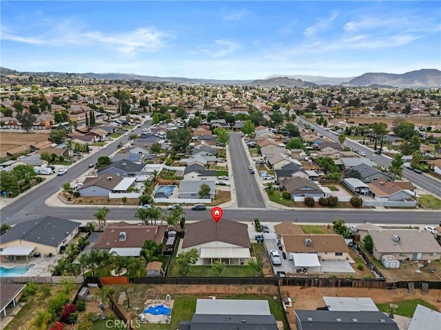 12705 Foreman Ave, Moreno Valley, CA 92553 - aerial view of property's location with nearby suburban area and a mountain backdrop