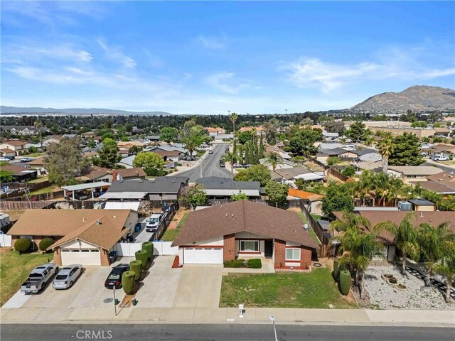 12705 Foreman Ave, Moreno Valley, CA 92553 - aerial perspective of suburban area with a mountainous background