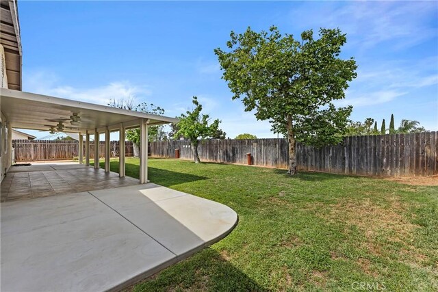 12705 Foreman Ave, Moreno Valley, CA 92553 - view of yard featuring a ceiling fan and a patio area
