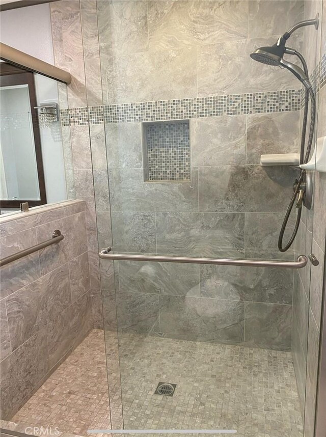 12705 Foreman Ave, Moreno Valley, CA 92553 - full bathroom featuring a shower stall