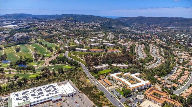 4004 Calle Sonora Oeste Unit 1F, Laguna Woods, CA 92637 - aerial view of a golf club and a water and mountain view