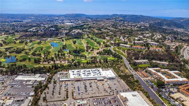 4004 Calle Sonora Oeste Unit 1F, Laguna Woods, CA 92637 - aerial view of property and surrounding area with a water and mountain view and a golf club