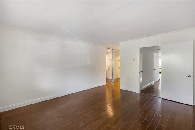 4004 Calle Sonora Oeste Unit 1F, Laguna Woods, CA 92637 - empty room with ornamental molding, dark wood-type flooring, and baseboards