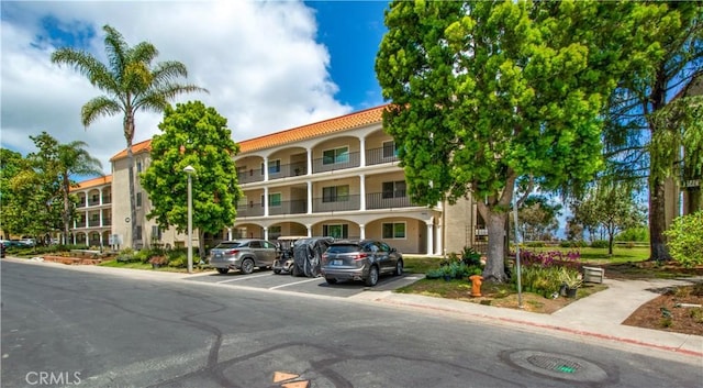 4004 Calle Sonora Oeste Unit 1F, Laguna Woods, CA 92637 - view of property featuring uncovered parking