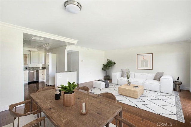 4004 Calle Sonora Oeste Unit 1F, Laguna Woods, CA 92637 - living room with ornamental molding, wood finished floors, and baseboards