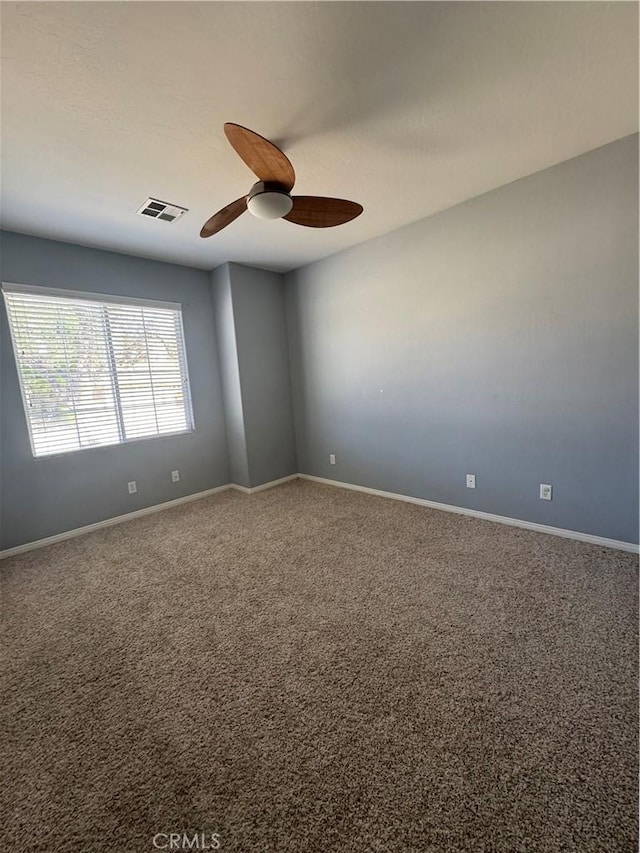4809 Prairie Meadows Way, Bakersfield, CA 93312 - spare room featuring a ceiling fan, baseboards, and carpet flooring