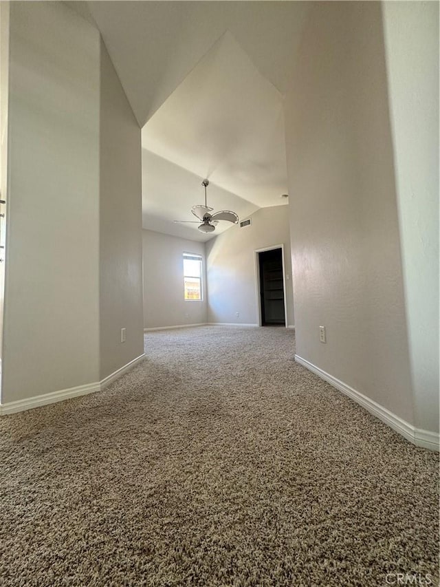 4809 Prairie Meadows Way, Bakersfield, CA 93312 - spare room featuring vaulted ceiling, baseboards, and carpet