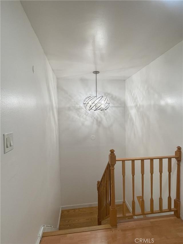 6 Rawhide Ln, Carson, CA 90745 - stairway featuring wood finished floors and baseboards