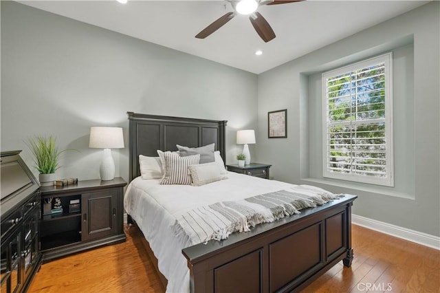 23423 Waterway Ln Unit 17, Valencia, CA 91355 - bedroom with wood finished floors, baseboards, recessed lighting, and ceiling fan