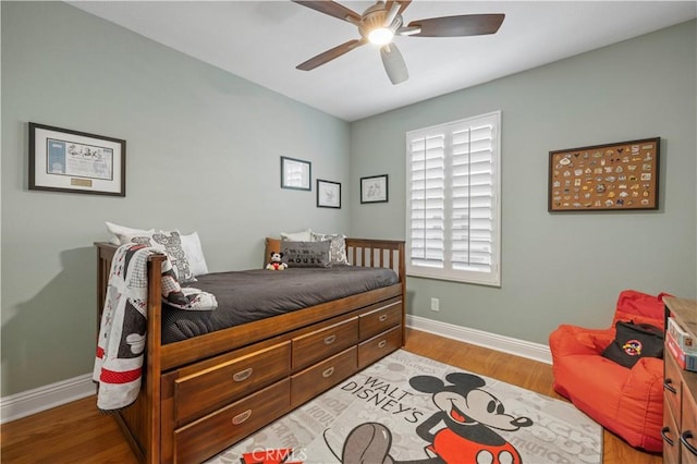 23423 Waterway Ln Unit 17, Valencia, CA 91355 - bedroom featuring baseboards, light wood-type flooring, and ceiling fan
