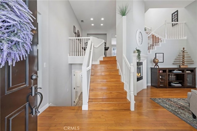 23423 Waterway Ln Unit 17, Valencia, CA 91355 - foyer entrance featuring stairway, wood finished floors, baseboards, and recessed lighting