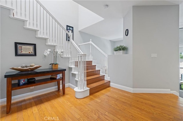 23423 Waterway Ln Unit 17, Valencia, CA 91355 - stairway with hardwood / wood-style flooring and baseboards