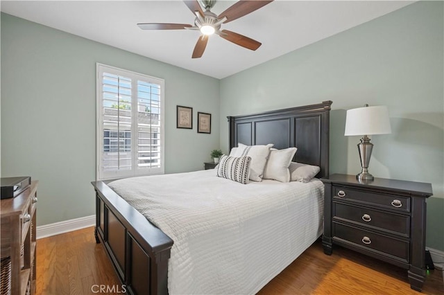 23423 Waterway Ln Unit 17, Valencia, CA 91355 - bedroom featuring dark wood finished floors, baseboards, and a ceiling fan
