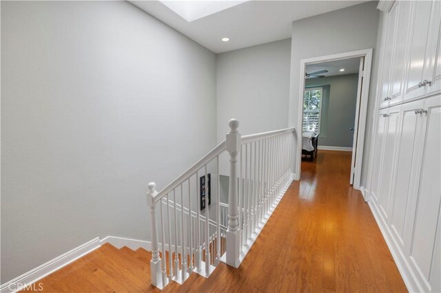 23423 Waterway Ln Unit 17, Valencia, CA 91355 - corridor with an upstairs landing, light wood-type flooring, baseboards, and recessed lighting