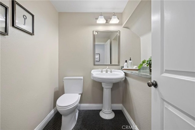 23423 Waterway Ln Unit 17, Valencia, CA 91355 - bathroom with tile patterned floors, toilet, and baseboards