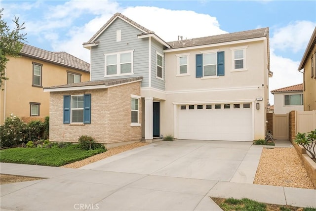 4574 S Mendocino Ave, Ontario, CA 91761 - traditional-style home with concrete driveway, an attached garage, and fence