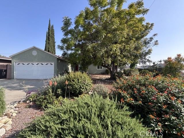 2020 W Swanee Ln, West Covina, CA 91790 - view of front of home featuring an attached garage and driveway