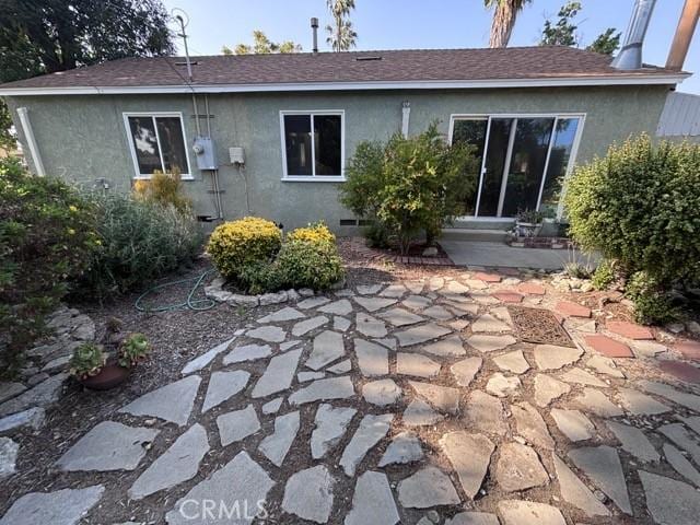 2020 W Swanee Ln, West Covina, CA 91790 - rear view of property with stucco siding, a patio area, and a shingled roof