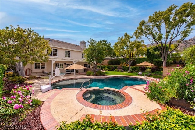 1280 Dumaine Ave, Oak Park, CA 91377 - view of swimming pool featuring a patio and a pool with connected hot tub