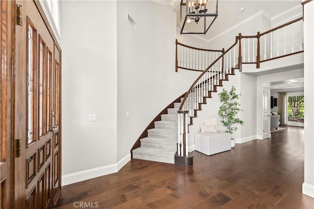 1280 Dumaine Ave, Oak Park, CA 91377 - entrance foyer featuring stairway, wood finished floors, a chandelier, a towering ceiling, and baseboards