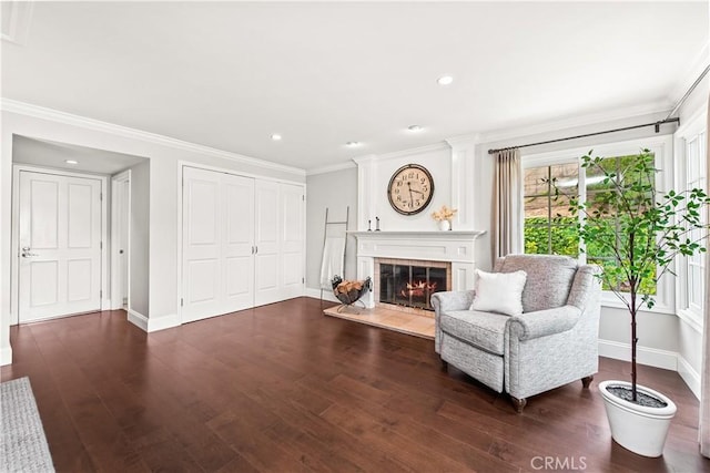 1280 Dumaine Ave, Oak Park, CA 91377 - living area with dark wood finished floors, a fireplace, baseboards, ornamental molding, and recessed lighting