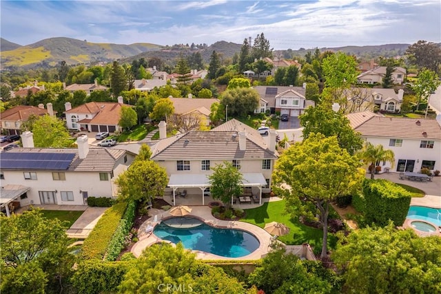 1280 Dumaine Ave, Oak Park, CA 91377 - aerial perspective of suburban area with a pool and mountains
