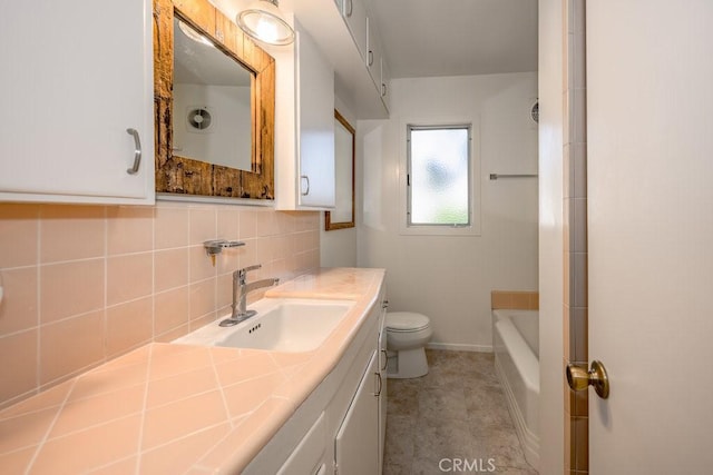 bathroom with toilet, tasteful backsplash, vanity, a bath, and a shower