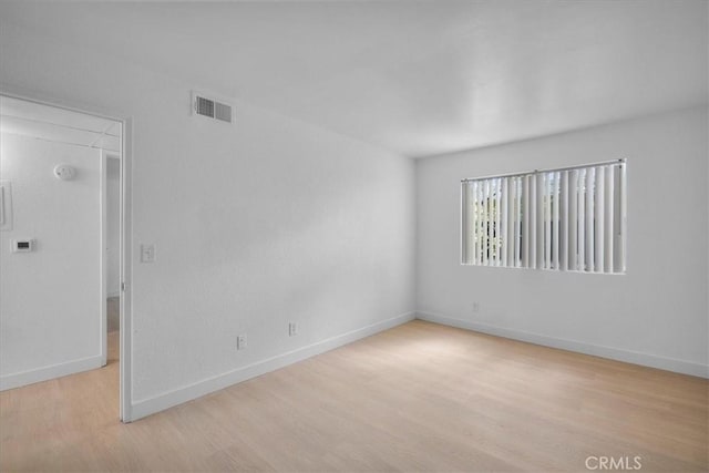14937 Dickens St Unit 209, Sherman Oaks, CA 91403 - spare room featuring wood finished floors and baseboards