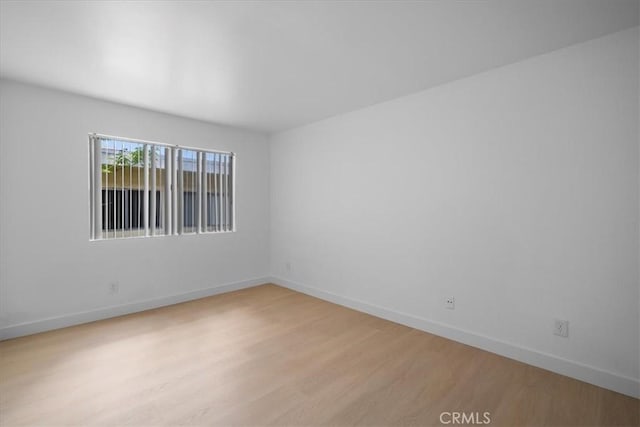14937 Dickens St Unit 209, Sherman Oaks, CA 91403 - spare room with light wood-style floors and baseboards