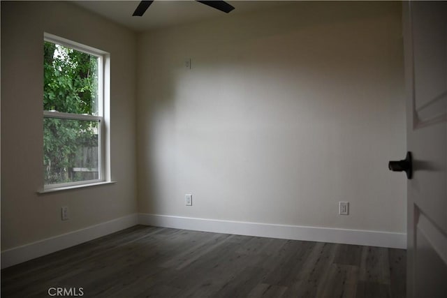 635 N Plumas St, Willows, CA 95988 - spare room with ceiling fan, dark wood finished floors, and baseboards