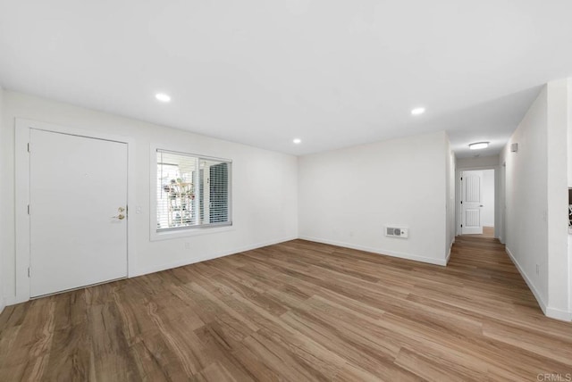 3825 Van Dyke Ave, San Diego, CA 92105 - entrance foyer with light wood-type flooring, baseboards, and recessed lighting