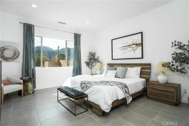 56231 Platinum Way, La Quinta, CA 92253 - bedroom with tile patterned floors, a mountain view, recessed lighting, and baseboards