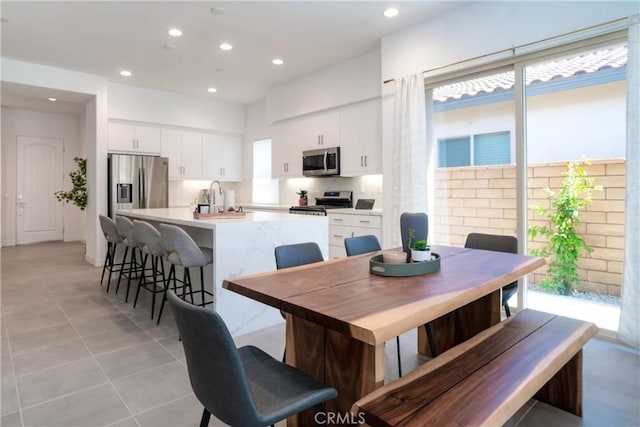 56231 Platinum Way, La Quinta, CA 92253 - dining room with recessed lighting and light tile patterned floors