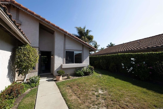 4843 Sumac Pl, Oceanside, CA 92057 - entrance to property with a yard, stucco siding, and a tile roof