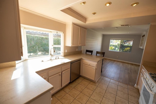 4843 Sumac Pl, Oceanside, CA 92057 - kitchen with dishwasher, a sink, a peninsula, gas range gas stove, and ornamental molding