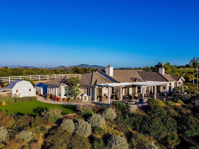 28623 Willow Park Rd, Escondido, CA 92026 - rear view of house featuring a pergola, a chimney, a patio, and a mountain view
