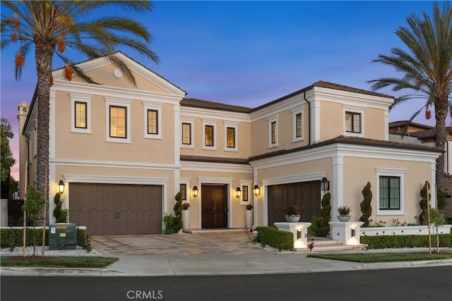 104 Scenic Crst, Irvine, CA 92618 - view of front of property featuring an attached garage, stucco siding, concrete driveway, and central air condition unit