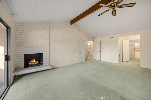 2622 N Tustin Ave Unit 147, Santa Ana, CA 92705 - unfurnished living room with carpet, a fireplace, and a ceiling fan
