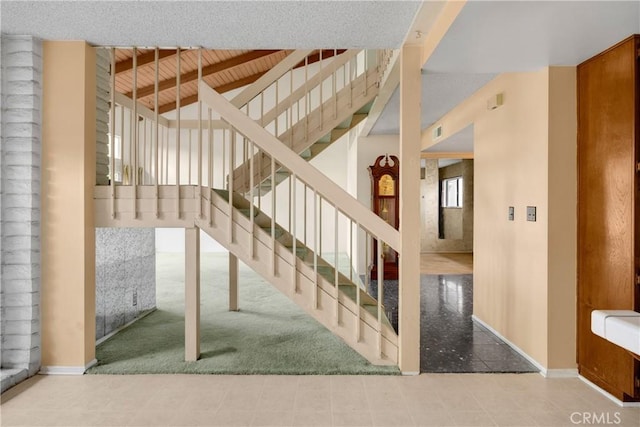 2622 N Tustin Ave Unit 147, Santa Ana, CA 92705 - staircase featuring baseboards and beamed ceiling