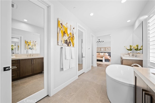 110 Mulberry, Lake Forest, CA 92630 - bathroom with connected bathroom, a soaking tub, recessed lighting, french doors, and two vanities