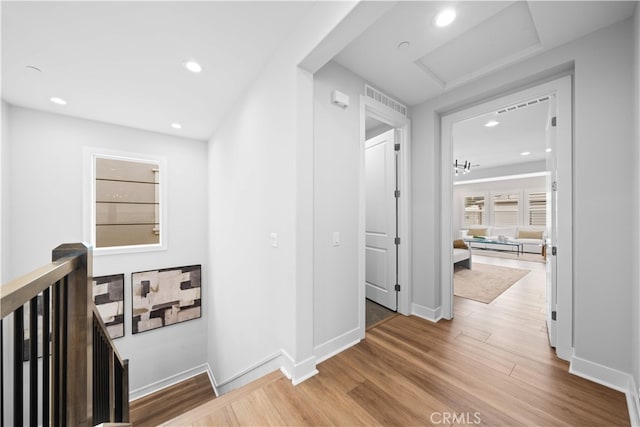 110 Mulberry, Lake Forest, CA 92630 - hallway with an upstairs landing, wood finished floors, recessed lighting, attic access, and baseboards