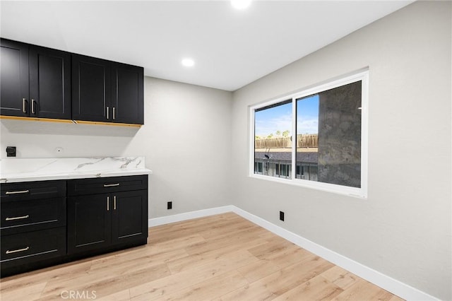 1000 Central Ave Unit 39, Riverside, CA 92507 - laundry room with cabinet space, baseboards, light wood-style floors, hookup for an electric dryer, and recessed lighting