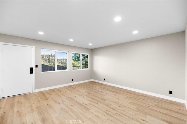 1000 Central Ave Unit 39, Riverside, CA 92507 - unfurnished room with light wood finished floors, baseboards, and recessed lighting
