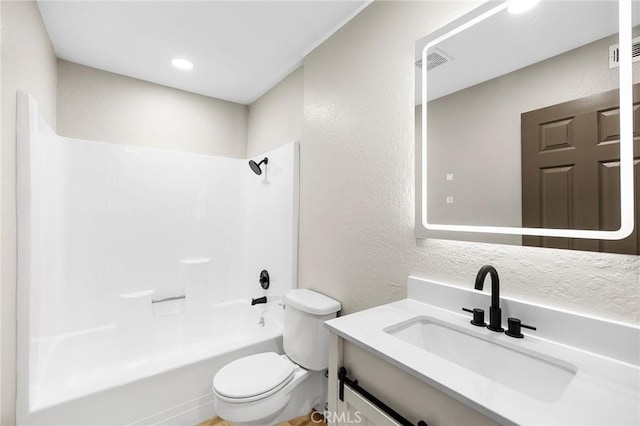 1000 Central Ave Unit 39, Riverside, CA 92507 - full bathroom with a textured wall, toilet, vanity, and washtub / shower combination