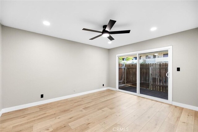 1000 Central Ave Unit 39, Riverside, CA 92507 - spare room with wood finished floors, a ceiling fan, baseboards, and recessed lighting